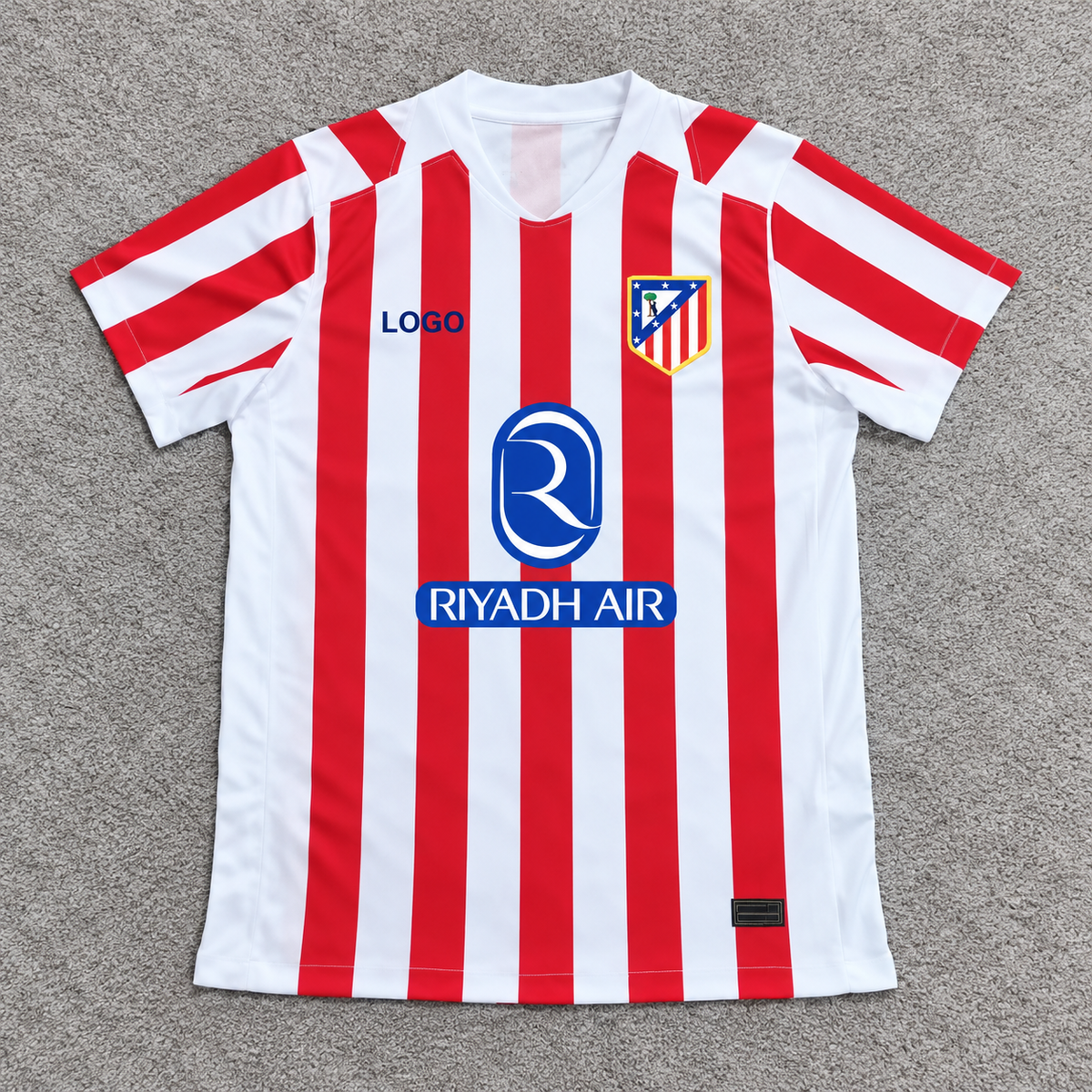 Atlético de Madrid · Local 26/27 · Fan · alfombra gris