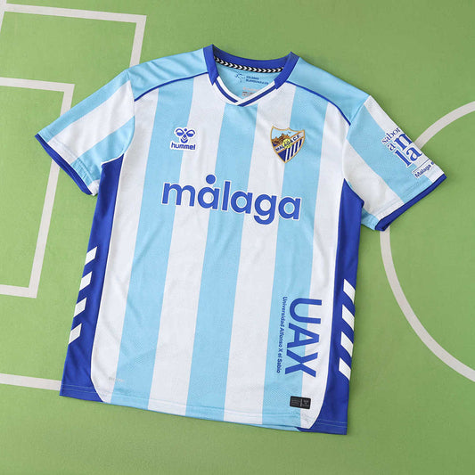25/26 Málaga CF Local Fan · Referencia del proveedor: 203872655