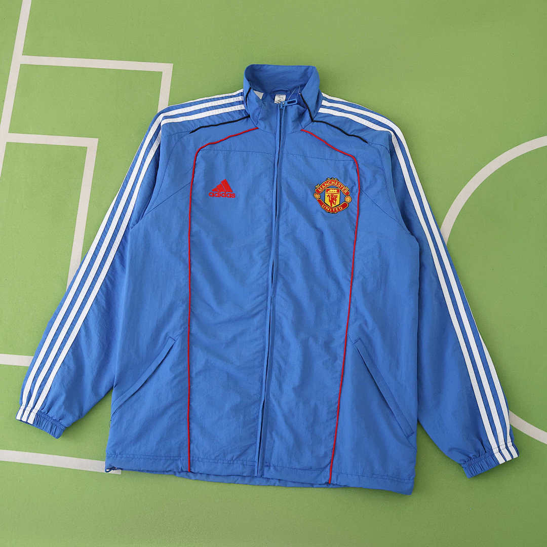 25/26 Manchester United F.C. black Cortavientos · Referencia del proveedor: 208073684