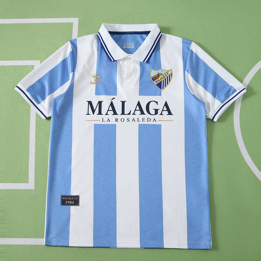 26/27 Málaga CF Retro Edición urbana Fan · Referencia del proveedor: 255764418